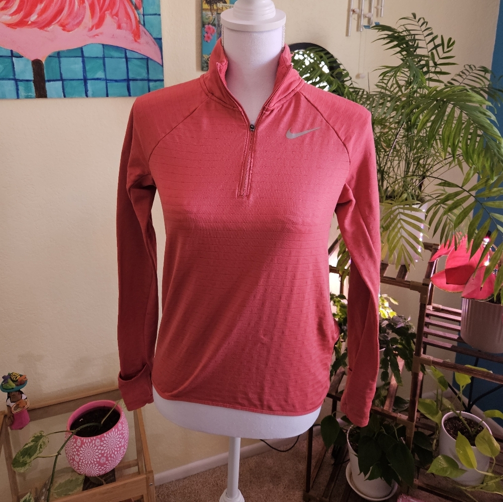 Nike Women’s Coral Pink Quarter-Zip Performance Pullover.
